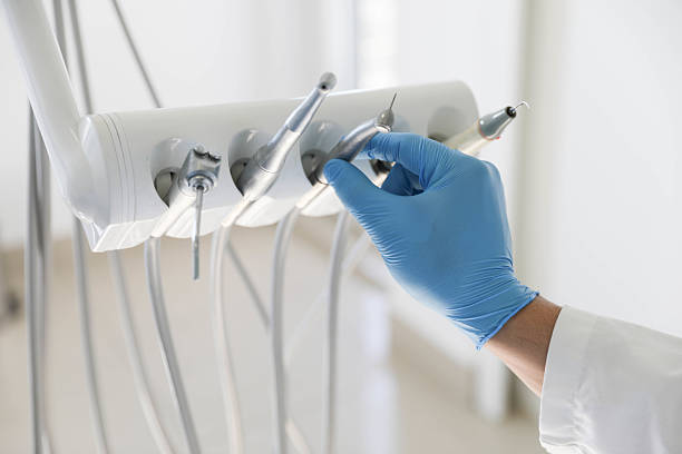 Professional Tooth Extraction technician working in Mesquite, TX